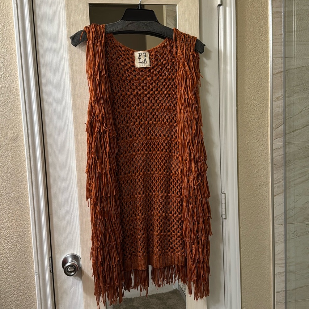 Women's PP LA clothing fringe vest SZ L
Rust Terracotta